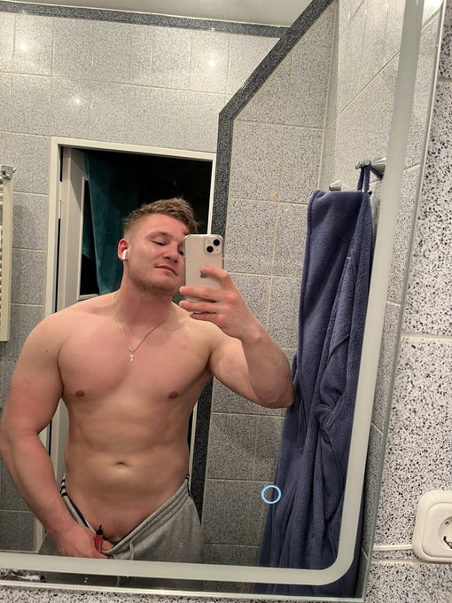 Dima (@dimareckless) gay tiktok onlyfans model standing without top