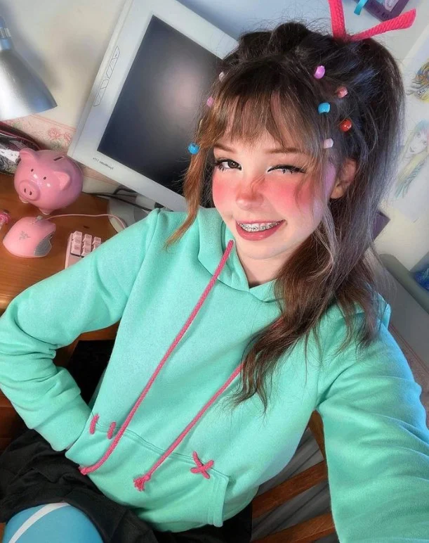 Belle Delphine (@belledelphine) Braces OnlyFans model sexy picture wearing green jacket