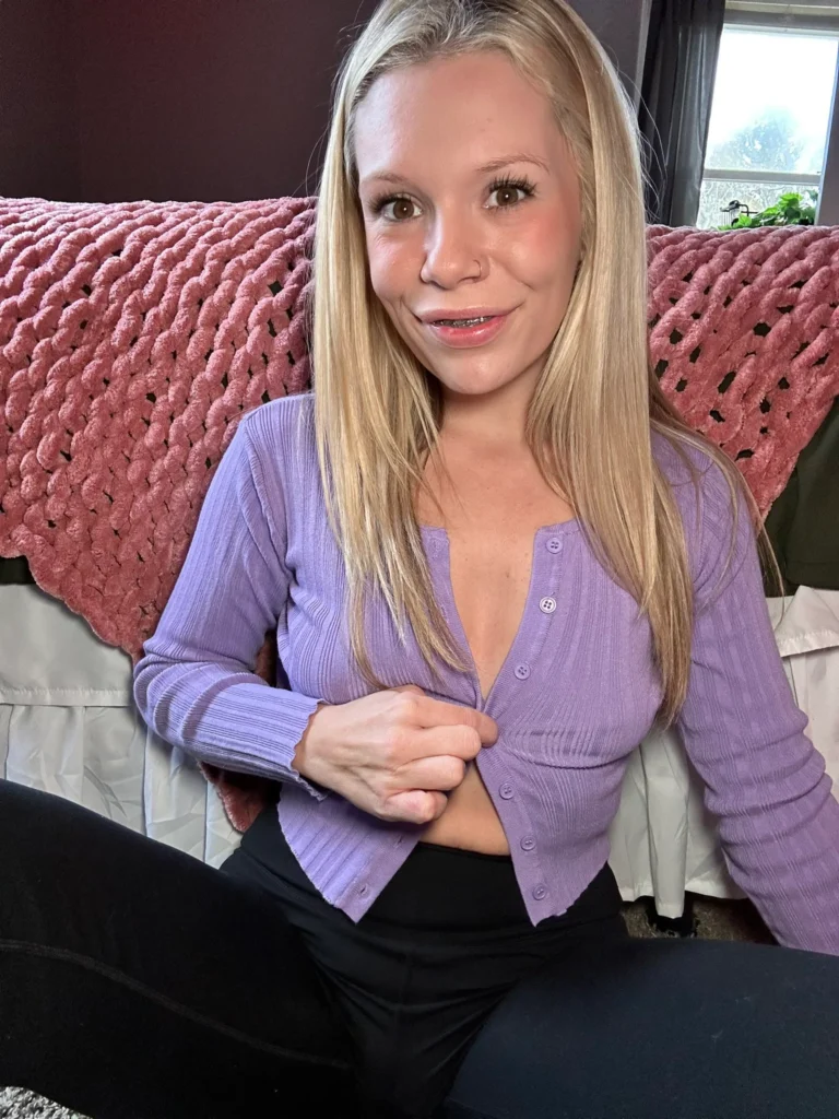 Miley Braces (@mileyxvip) OnlyFans model sexy picture wearing purple top